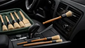 Detailing brushes cleaning an automotive air vent and center console